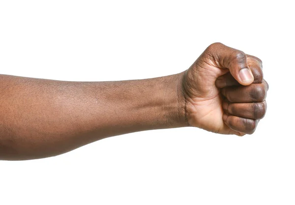 Hand of African-American man with clenched fist on white background — Stock Photo, Image