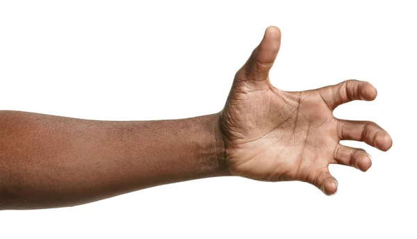Рука афро-американського чоловіка тримає щось на білому фоні — стокове фото