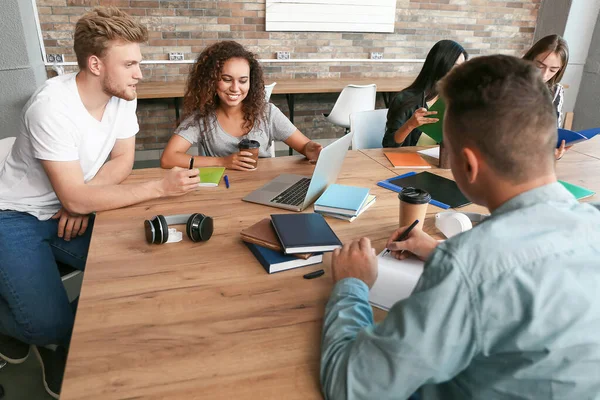 Group of students preparing for exam in university — Stock Photo, Image