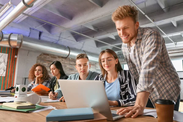 Group of students preparing for exam in university — Stock Photo, Image