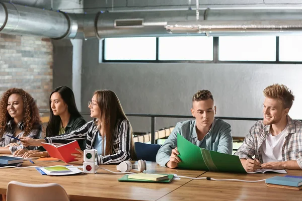 Group of students preparing for exam in university — Stock Photo, Image