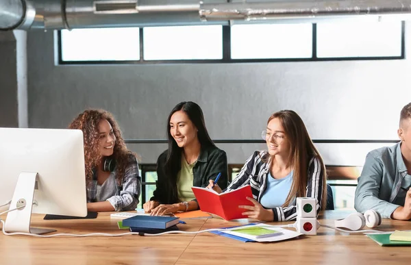 Group of students preparing for exam in university — Stock Photo, Image
