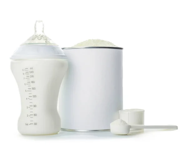 Bottle of milk and jar with baby formula on white background — Stock Photo, Image