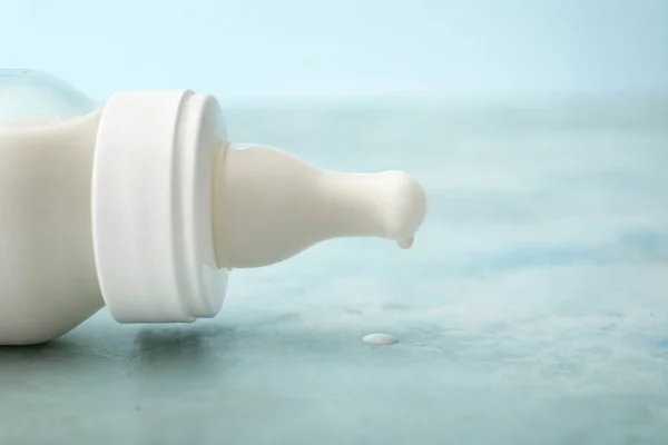 Bottle of baby milk formula on table — Stock Photo, Image