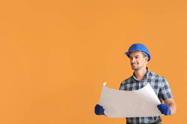 Portrait of male architect on color background — Stock Photo, Image