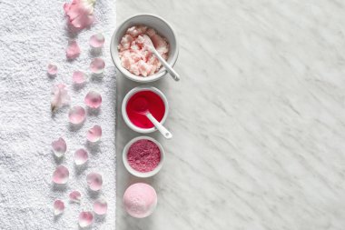 Composition with cosmetics for spa procedures on light background