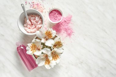 Composition with cosmetics for spa procedures on light background