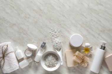 Composition with cosmetics for spa procedures on light background