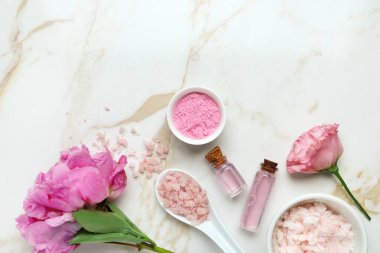 Composition with cosmetics for spa procedures on light background