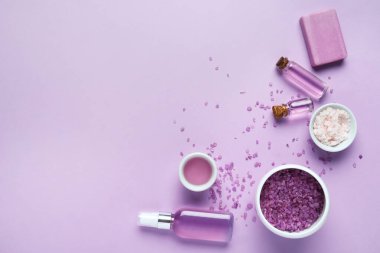 Composition with cosmetics for spa procedures on color background