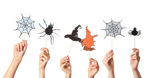 Many hands with Halloween decor on white background — Stock Photo, Image