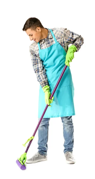 Young man with mop on white background — Stock Photo, Image