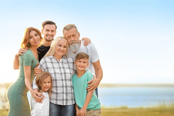 Portrait of big family in park — Stock Photo, Image