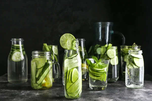 Healthy infused water on dark background — Stock Photo, Image