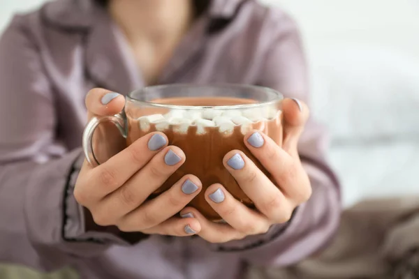 Young woman with cup of hot chocolate, closeup — Stock Photo, Image