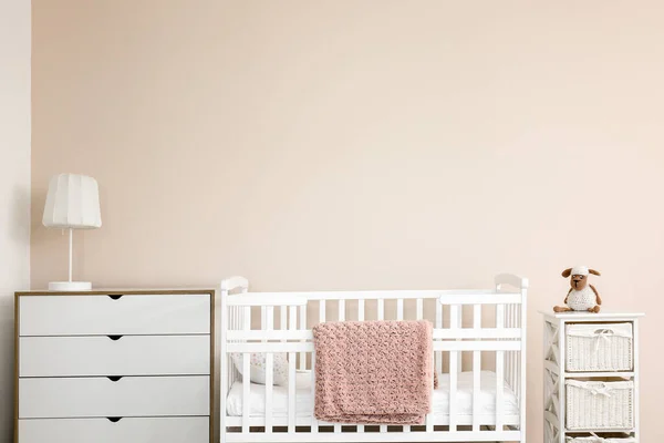 Interior of stylish children's room with baby bed — Stock Photo, Image