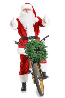 Bisikletli Noel Baba beyaz arka planda baş parmak hareketi gösteriyor