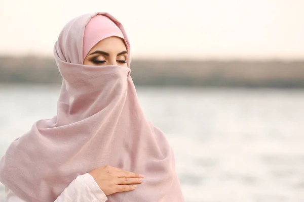 Portrait of beautiful Muslim woman outdoors — Stock Photo, Image