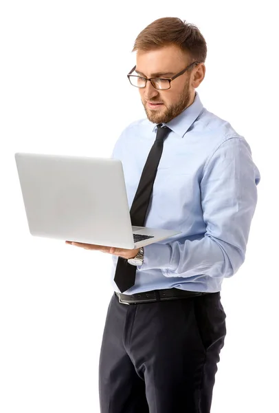 Portret van knappe zakenman met laptop op witte achtergrond — Stockfoto