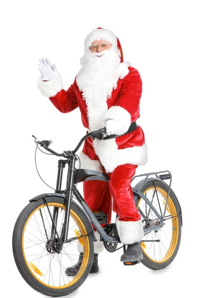 Babbo Natale con bicicletta su sfondo bianco — Foto Stock