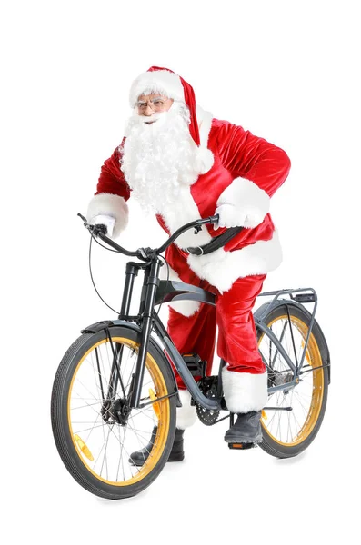 Papai Noel com bicicleta no fundo branco — Fotografia de Stock