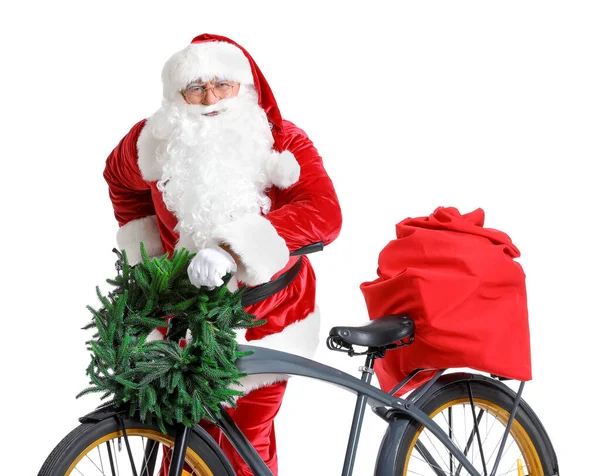 Santa Claus z prezentów świątecznych i rowerów na białym tle — Zdjęcie stockowe