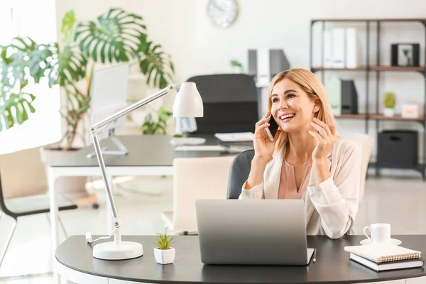 Beautiful businesswoman working in office — Stock Photo, Image