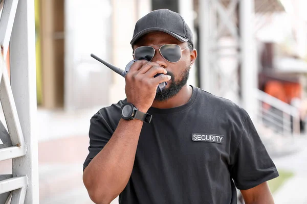 African-American security guard outdoors