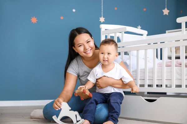 Asian mother and cute little baby playing at home — Stock Photo, Image