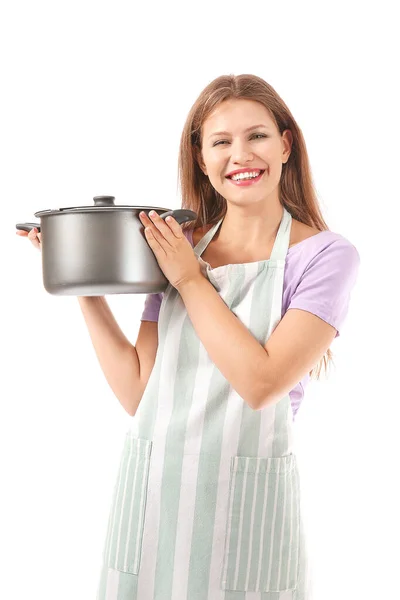 Beautiful young woman in apron and with saucepan on white background — Stock Photo, Image