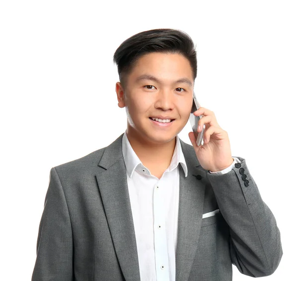 Portrait of Asian businessman talking by mobile phone on white background — Stock Photo, Image