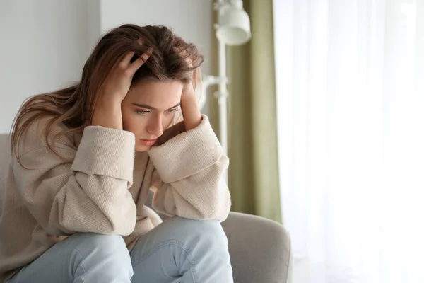 Portrait of depressed woman at home — ストック写真