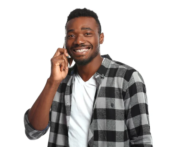 Portrait of handsome African-American man talking by mobile phone on white background — Stock Photo, Image