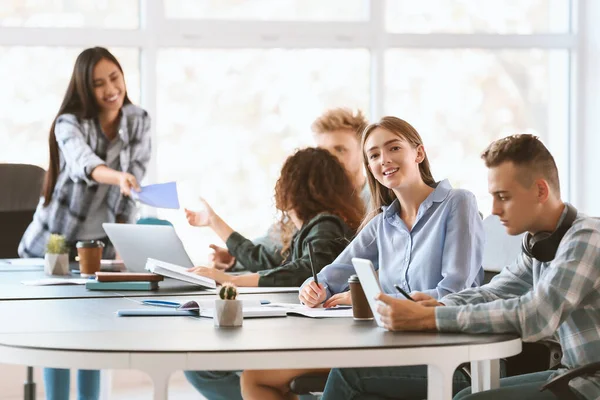 Group of students preparing for exam in university — Stock Photo, Image