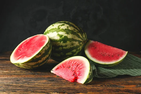 Tasty watermelon on wooden table — Stock Photo, Image