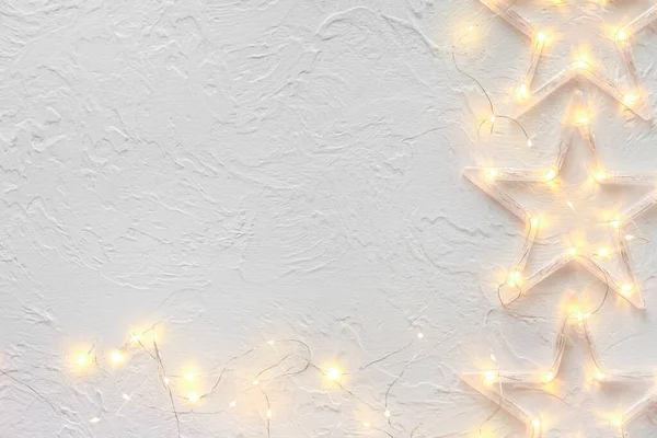 Beautiful glowing garland on white background — Stock Photo, Image