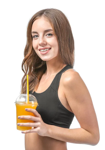 Wanita muda cantik dengan jus jeruk di latar belakang putih — Stok Foto