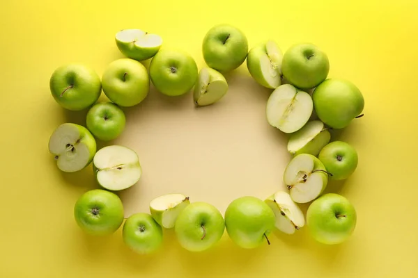 Frame made of ripe apples on color background — Stock Photo, Image