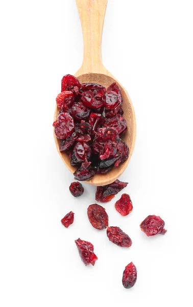 Spoon with dried cranberries on white background — Stock Photo, Image