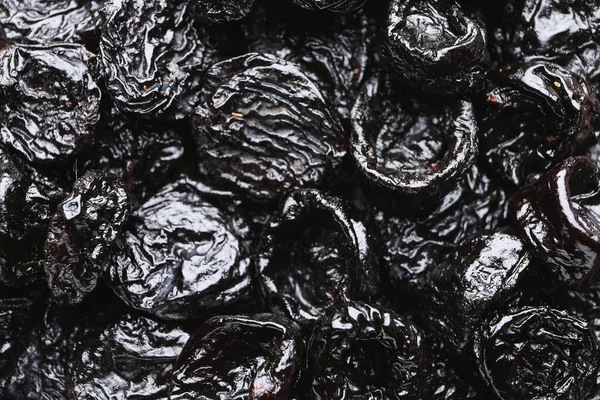 Heap of tasty prunes, closeup — Stock Photo, Image