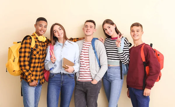 Portrait of teenagers on color background — Stock Photo, Image