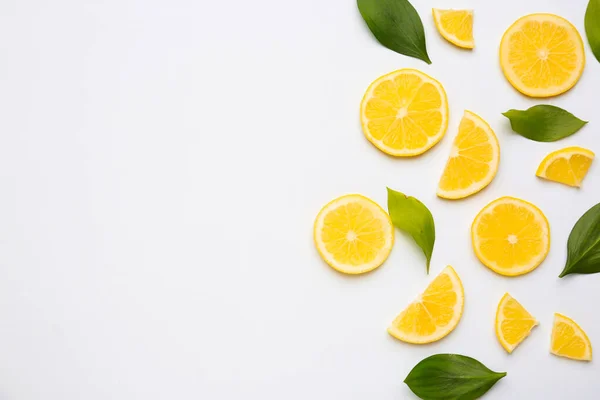 Ripe cut lemons on white background — Stock Photo, Image