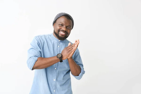 Portrait of happy African-American man on white background — Stock Photo, Image