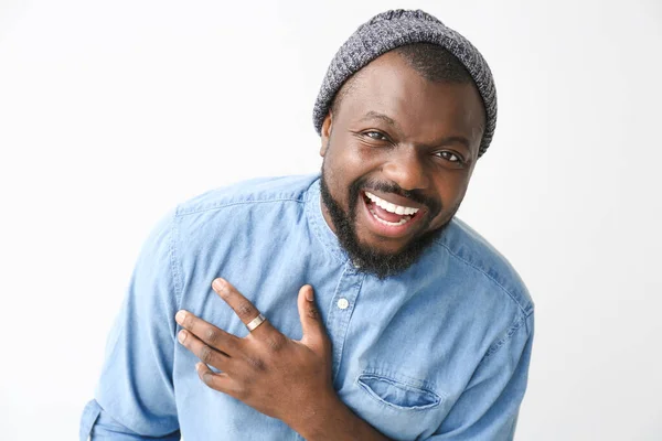 Portrait of happy African-American man on white background — Stock Photo, Image