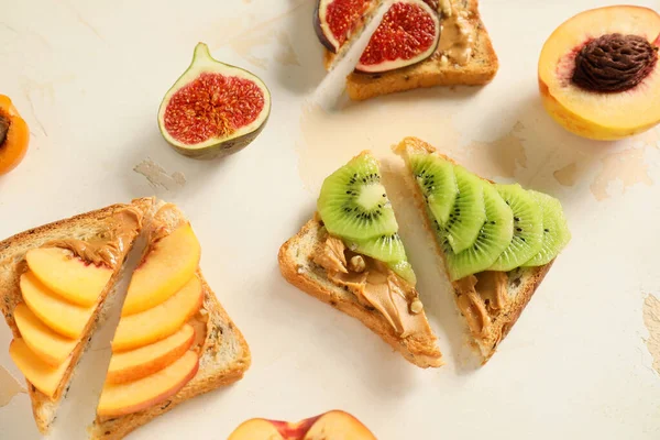 Tasty sweet sandwiches on white background — Stock Photo, Image