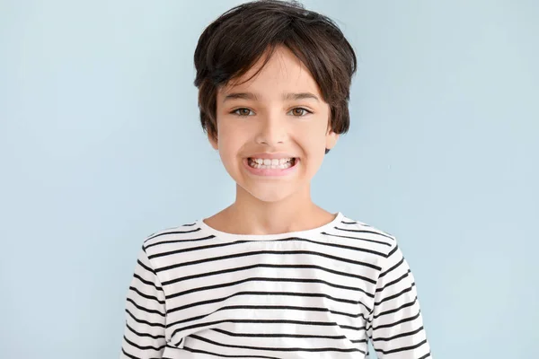 Happy little boy on light background — Stock Photo, Image