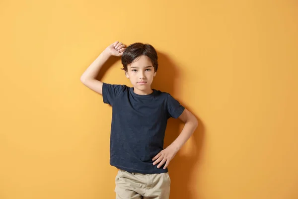 Cute little boy on color background — Stock Photo, Image