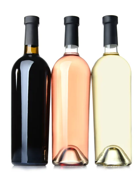 Botellas de diferentes vinos sobre fondo blanco — Foto de Stock