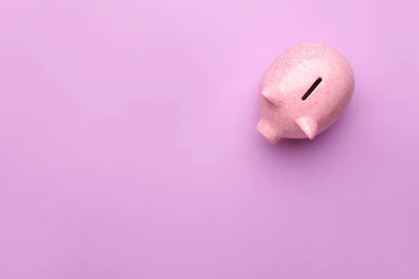 Piggy bank on color background — Stock Photo, Image