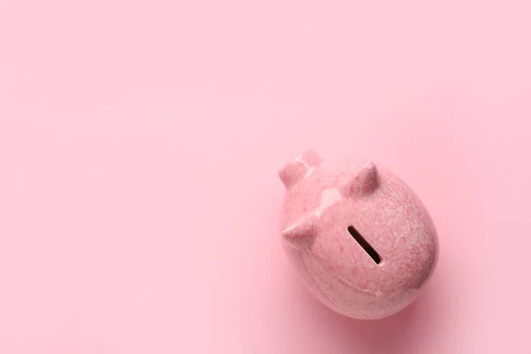 Piggy bank on color background — Stock Photo, Image